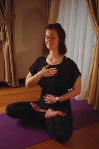 Teacher Maria in Bliss teaching Hatha Yoga Postures